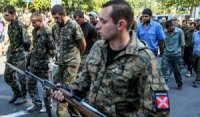 По данным Киева, в Новороссии около 700 украинских военных попали в плен после последних боев