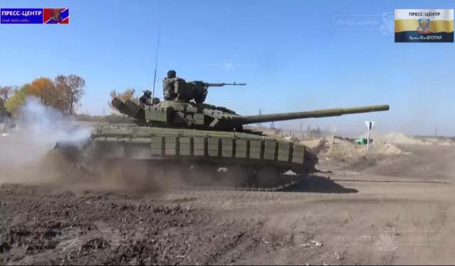 С 4 октября ночью и днем идет обстрел позиций ополченцев, и поселка Веселая гора С 4 октября ночью и днем идет обстрел позиций ополченцев, и поселка Веселая гора