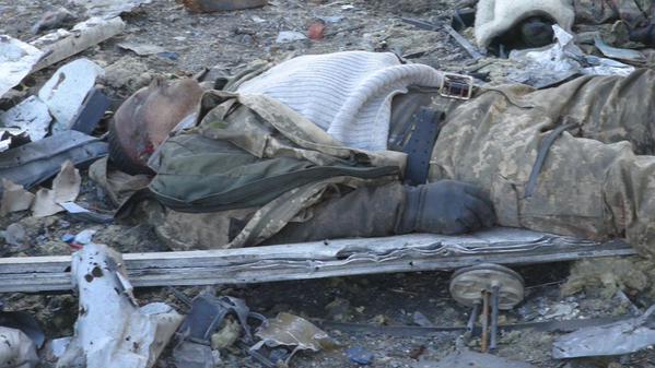 В Донецком аэропорту найдено 30 тел украинских военных 18+ В Донецком аэропорту найдено 30 тел украинских военных 18+