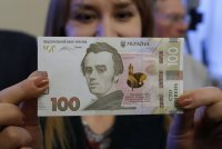 Эмиссия гривны от-кутюр: "Брюки превращаются... брюки превращаются..."