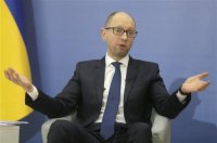 Яценюк: Киев приостановил выполнение Минских договоренностей