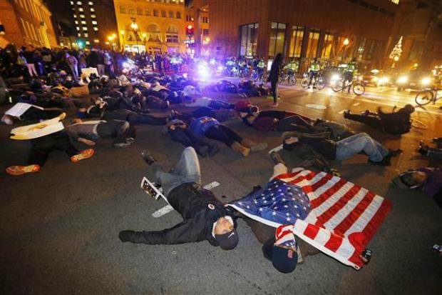 Полиция США отстреливает сограждан Полиция США отстреливает сограждан