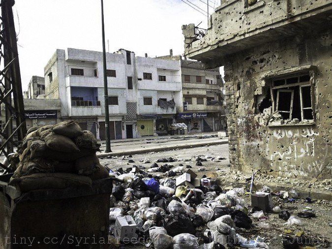 Боевики ИГИЛ исписали город угрозами в адрес России Боевики ИГИЛ исписали город угрозами в адрес России