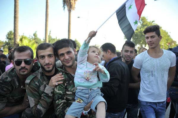 Митинг в поддержку операции ВКС России прошел в сирийском Тартусе Митинг в поддержку операции ВКС России прошел в сирийском Тартусе